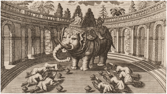 Ein mit einem Sattel ausgestatteter Elefant in einer Arena. Ihm zu Füßen liegen acht Gestalten.